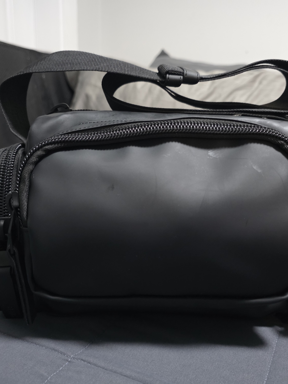 RAINS Black Crossbody Sling Bag - Minimal Everyday Carry